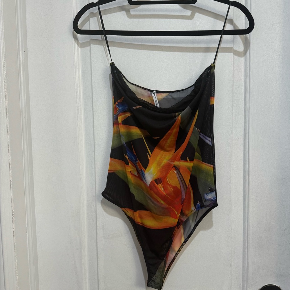 Women’s Zara body suit. size large.